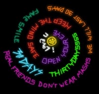 a neon spiral with words written on it